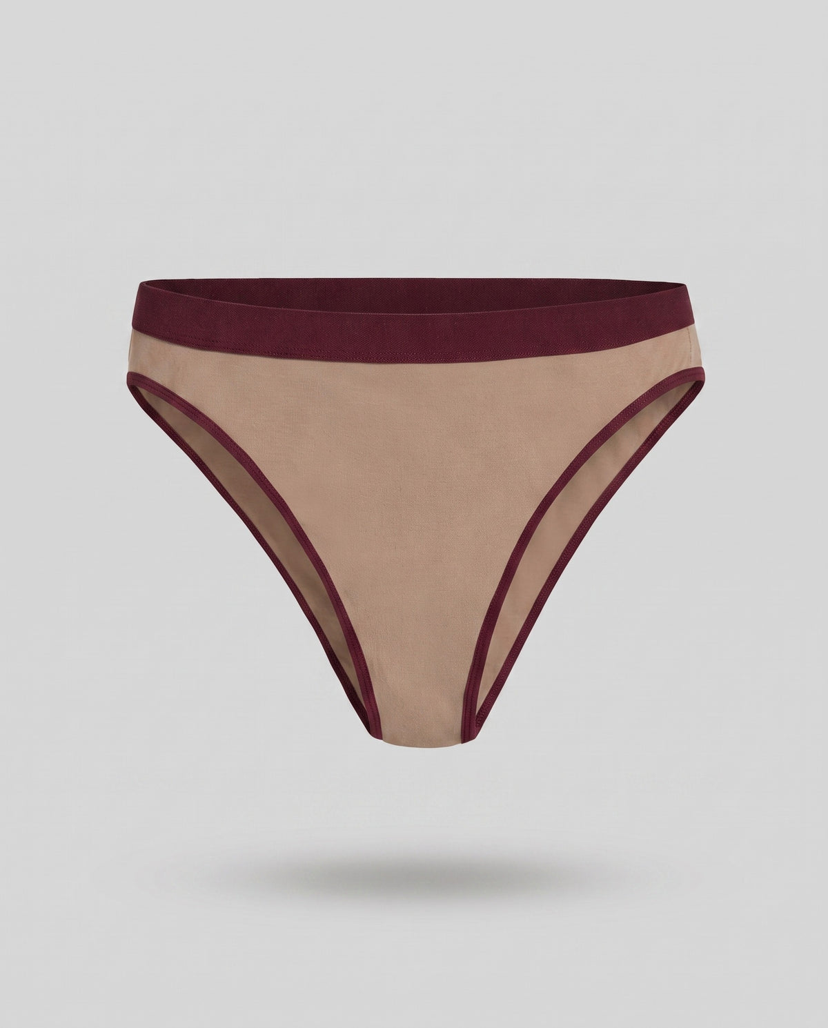 A KAYA mocha cotton French brief with a wine band, on a pale grey backdrop