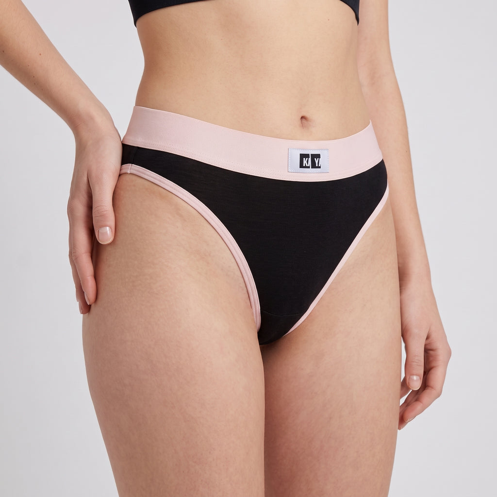 Cotton Thong + Elastic + Logo, worn, close-up